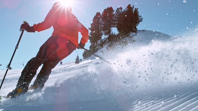 Super slow motion of piste skier running down. Filmed on high speed cinema camera, 1000fps. Speed ramp effect.