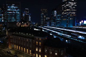 Fototapeta na wymiar A night panoramic cityscape in front of Tokyo station wide shot