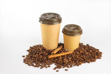 Coffee paper cups, coffee beans and cinnamon on white background.