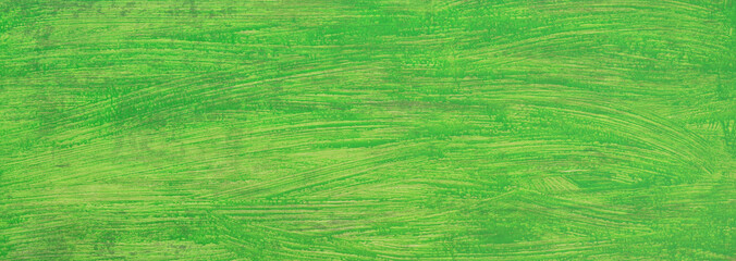 fresh green paint on wooden background