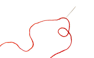 Red thread isolate on white background. Selective focus. Old. - obrazy, fototapety, plakaty