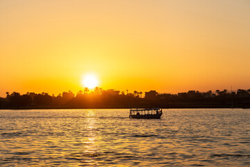 Boat on Nile at sunset