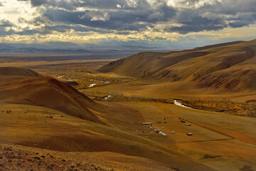 Russia. The South of Western Siberia, the Altai Mountains. Picturesque autumn view of the valley of the Kyzylshin river near the village of Kokorya.