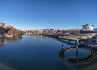 Obraz premium Bridges, hotels and office building at the canal Karlbergskanalen, a sunny winter day in Stockholm