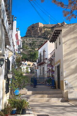 Typical street in Barrio Santa Cruz in Alicante, Costa Blanca, Spain