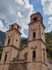 Fototapeta na wymiar Cathedral of Saint Tryphon, a romanesque cathedral with two baroque towers. Kotor, Montenegro, Europe