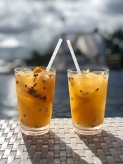 pair of a typical Brazilian yellow fruit cocktail 