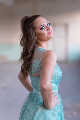Portrait of young, teen girl in blue lace dress, ready for her prom night © stivog