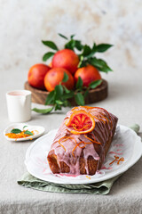 Blood orange  cake with glaze . Fruit citrus baking