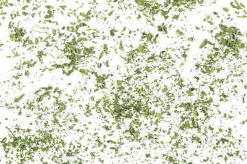 Chopped dry parsley leaves, pile isolated on white background, top view