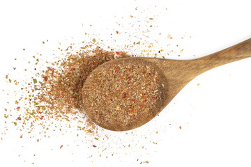 Garam masala, minced spice blend in wooden spoon, mix black pepper, coriander, cumin, garlic...