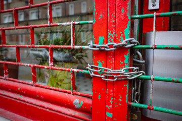 Lock on a red gate in central London England