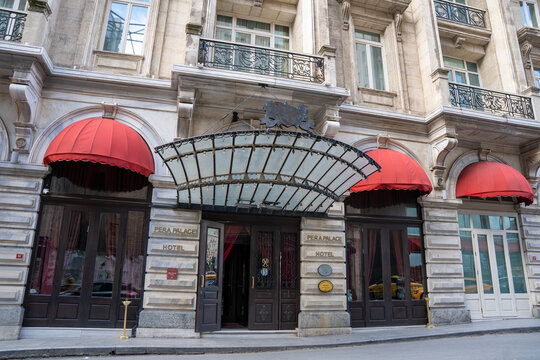 Istanbul, Turkey - February 10, 2023: Entrance of Pera Palas Hotel in Beyoglu district. The Pera Palace Hotel is a historic special category hotel and museum hotel. 