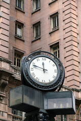 Fototapeta na wymiar Clock in front of Martinelli Building, Sao Paulo city, Brazil
