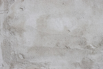 The wall is covered with rough putty.