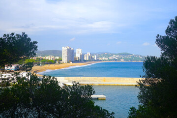 Naklejka premium beach La Platja Gran, Platja Gran d'Aro, long white sandy beach with promenade, high-rise apartments and bars on the Mediterranean Sea, Costa Brava, Girona, Catalonia, Spain