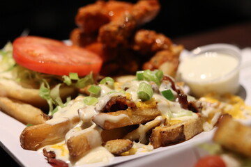 chicken wings with salad