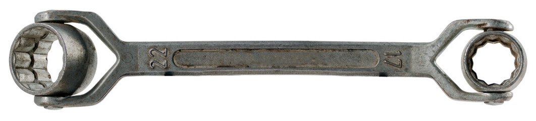 Universal ring spanner used in the mechanical workshop. Isolated background.