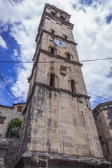 Fototapeta premium Bell tower of St Nicholas Church in Perast village, Kotor Bay, Montenegro