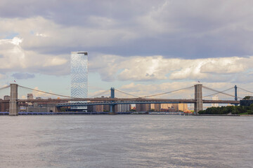 Fototapeta premium Gorgeous view of Hudson river, Manhattan skyscrapers and Brooklyn bridge. USA. New York. 