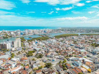 Fototapeta na wymiar Imagem aérea da região de Muquiçaba e da Igreja São Pedro, na regial central de Guaraparia, maior destino turístico do Espírito Santo.