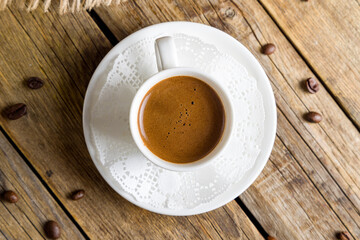 hot chocolate in white mug top view on wooden table
