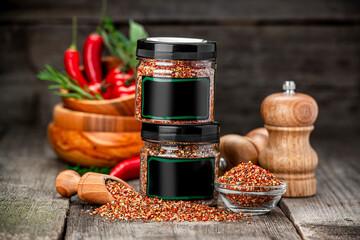 A mixture of different spices for cooking meat. Spice shop.