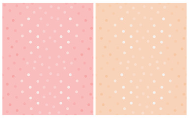 Simple Dotted Seamless Vector Patterns. Glowing Tiny Dots Isolated on a Pastel Pink and Light Coral Background. Polka Dots Print. Cute Simple Abstract Repeatable Print with Spots ideal for Fabric.