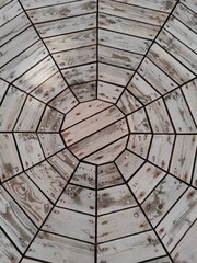 Wood tile floor with greographical design