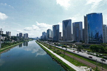 Fototapeta na wymiar Urban landscape with river and roads in the Marginal Pinheiros. Sao Paulo city, Brazil