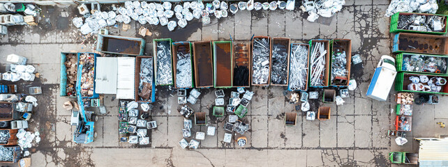 Containers from a height with different types of metal, Sorting for remelting metal products