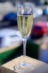 Dinner party, drinking of cava or champagne sparkling wine in vacation resort Caleta Fuste, Fuerteventura, Canary islands vacation, Spain