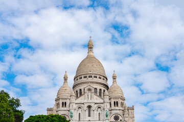 Fototapeta na wymiar The Basilica of the Sacred Heart (Sacre Cœur Basilica). Montmartre, Paris, France