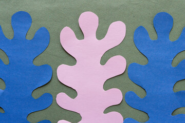 blue and pink cut paper shapes in the form of polyps, columnar, finger, fringe, or organics