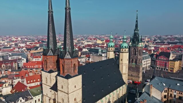 Drone shot revealing Marktkirche Unser Lieben Frauen (Market Church Of Our Lady), Halle (Saale) city , Saxony-Anhalt  , Germany .
