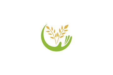 Obraz premium Wheat care logo with hand and wheat shape symbol simple design concept