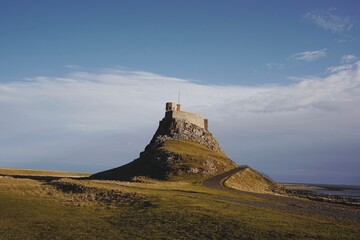 Castle on the Hill in Holy Island, UK