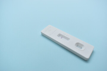 covid test kit on blue background