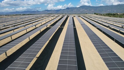 Solar farm with bifacial modules and trackers