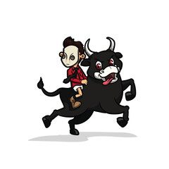 Boy riding a black bull