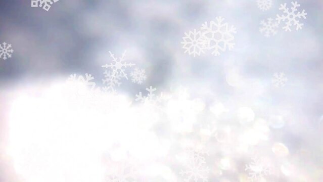 キラキラ光る雪のアップと雪の結晶イメージ（パンニング）