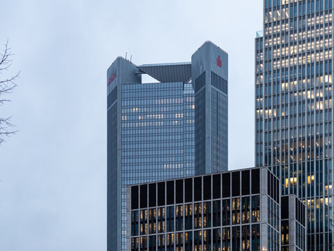 FRANKFURT, GERMANY - 31. January 2023: Sparkasse and Deka Investment Bank skyscraper in the financial district. Trianon business tower in Frankfurt. Urban architecture in the evening.
