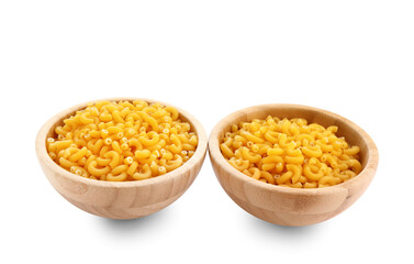 Wooden bowls of raw elbow pasta on white background