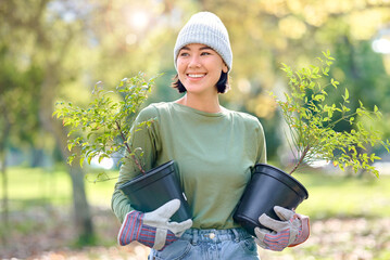 Plants, gardening and woman volunteering for agriculture, growth project and sustainability on earth day. Park, natural environment and community service worker, farmer or person with trees in forest - Powered by Adobe