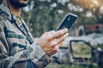 Military soldier, mobile phone and communication while outdoor for connection, safety and security....