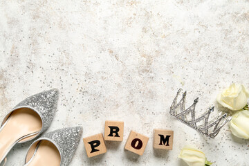 Word prom with tiara, heels and roses on grunge background