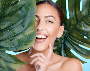 Beauty, plant leaf and portrait of woman face happy about natural dermatology, cosmetics and makeup. Person with spa green skincare product benefits for self care, skin glow and facial with a smile