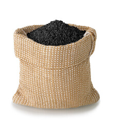 black cumin seeds in burlap bag isolated on white