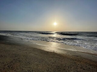sun rising at the beach