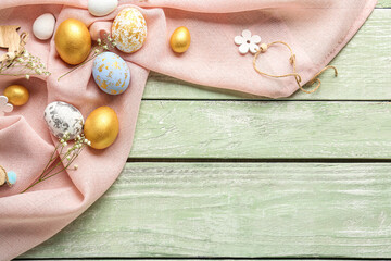Composition with beautiful Easter eggs, gypsophila flowers and decor on color wooden background
